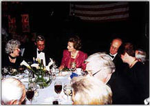 Lady Thatcher converses with Sue Young and John Marsh during the black-tie dinner held in Thatcher's honor.