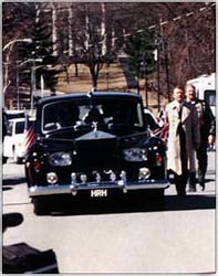 The Thatcher car travels through the streets of Fulton